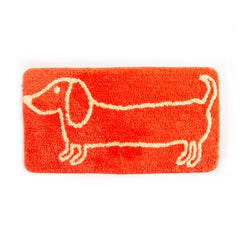 Bathroom mat, orange dog