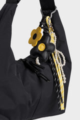 Laukkukoriste I Musta ja keltainen kukka - Lempi Lifestyle